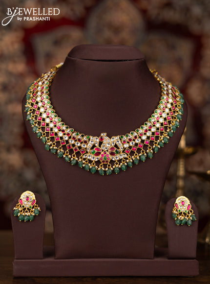 Jadau necklace lotus design with jadau kundan stones and pearl & green beads hangings