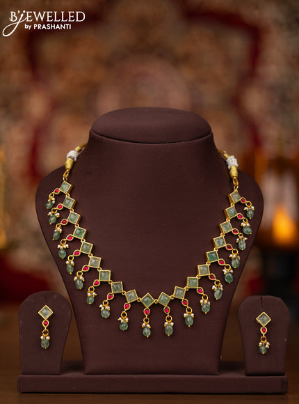 Jadau necklace with pink jadau & mint green stones and beads hangings