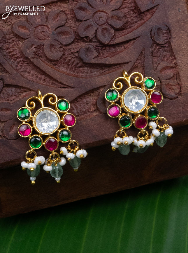 Jadau screw type earrings with jadau kundan stones and pearl & mint green beads hanging