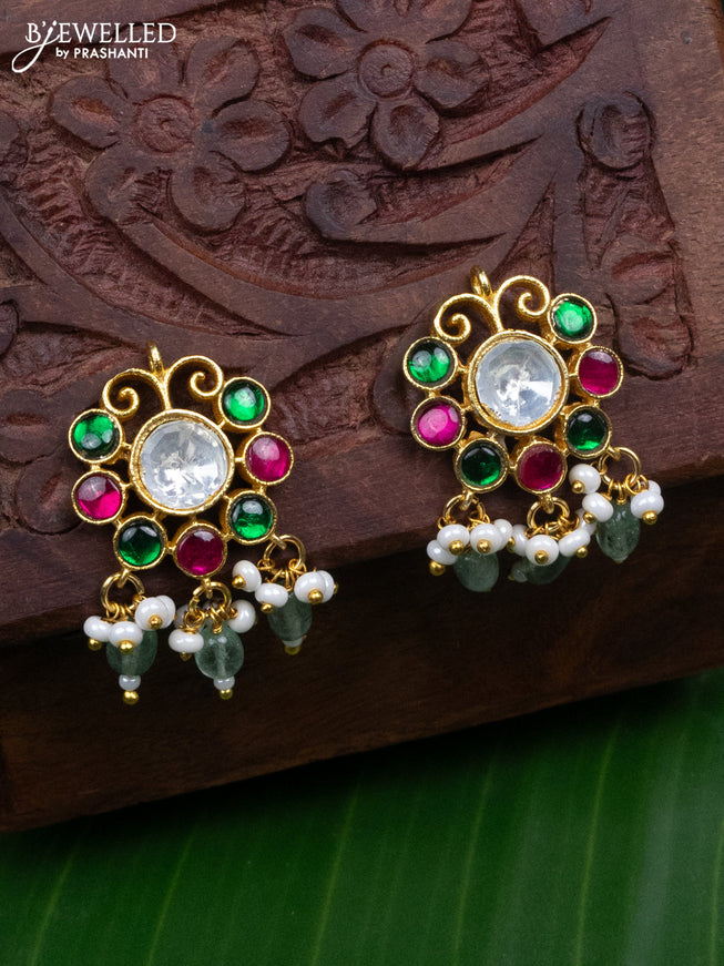 Jadau screw type earrings with jadau kundan stones and pearl & mint green beads hanging