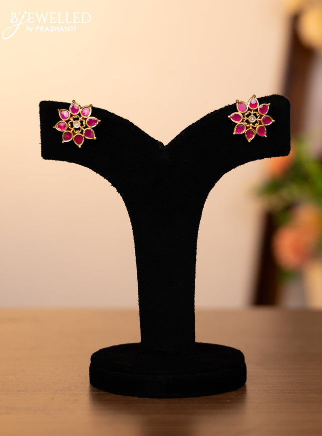Jadau screw type earrings with pink jadau & kundan stones and golden beads hangings