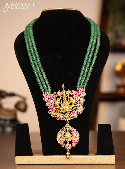 Antique beaded green haaram lakshmi pendant with jadau kundan stones and golden beads hanging without earrings
