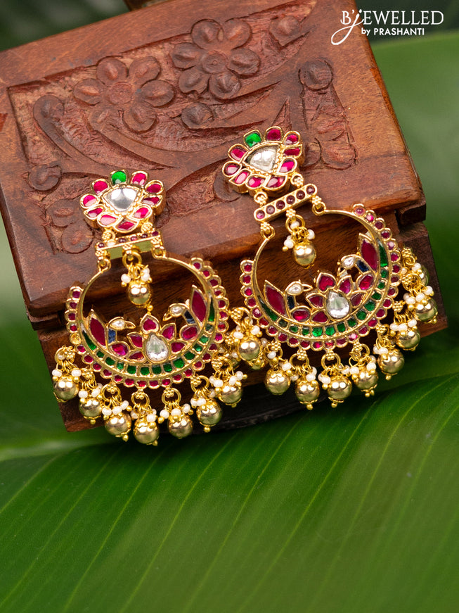 Antique screw type earrings with jadau kundan stones and pearl & golden beads hanging