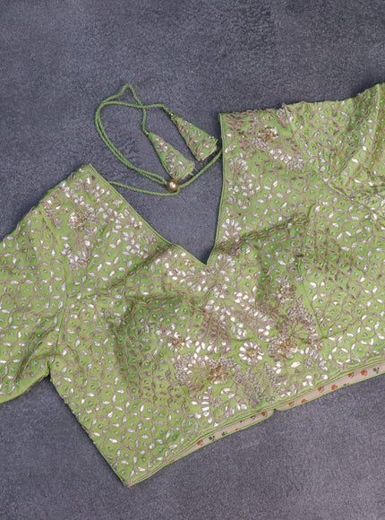 Tissue silk saree pista green with allover silver & zari weaves and zari woven border