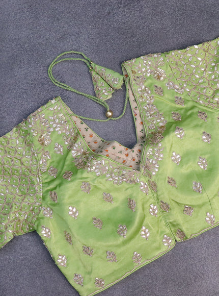Tissue silk saree pista green with allover silver & zari weaves and zari woven border