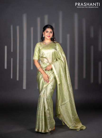 Tissue silk saree pista green with allover silver & zari weaves and zari woven border