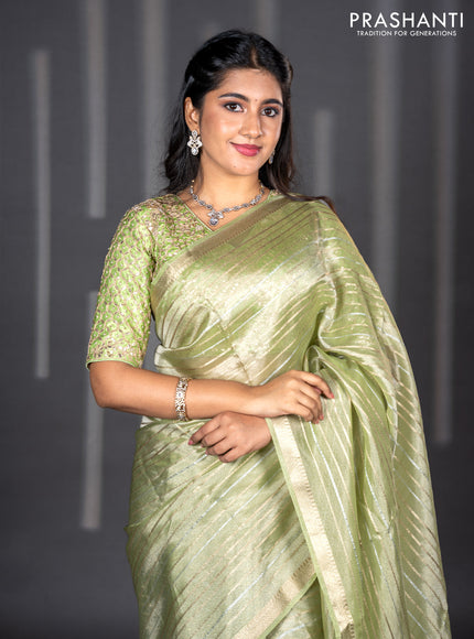 Tissue silk saree pista green with allover silver & zari weaves and zari woven border