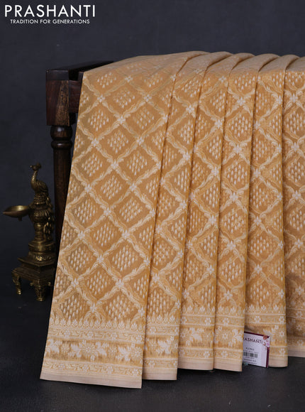 Banarasi silk cotton saree sandal with allover zari weaves and thread & zari woven border