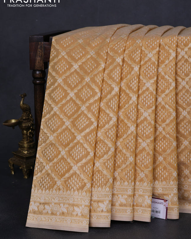 Banarasi silk cotton saree sandal with allover zari weaves and thread & zari woven border