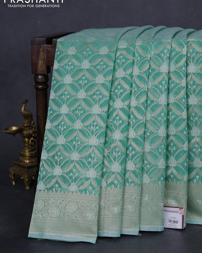 Banarasi silk cotton saree teal shade with allover zari weaves and zari woven border