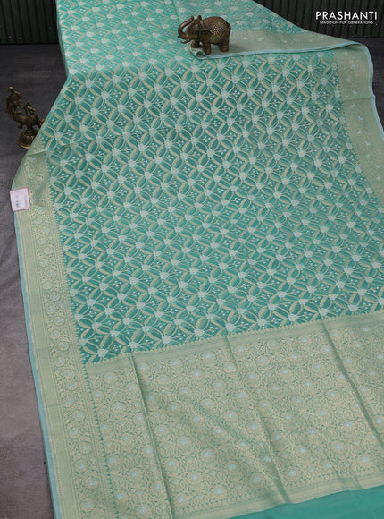 Banarasi silk cotton saree teal shade with allover zari weaves and zari woven border