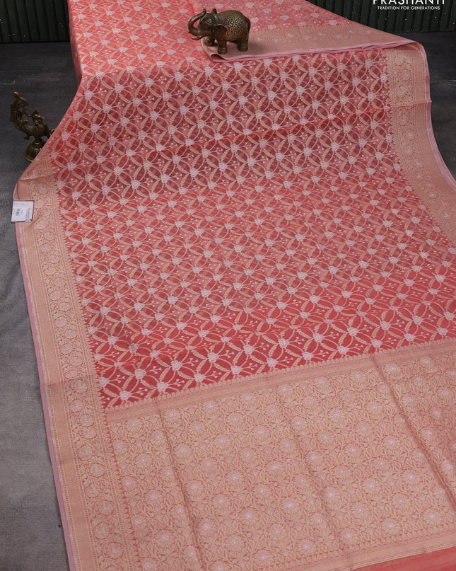 Banarasi silk cotton saree peach pink with allover zari weaves and zari woven border