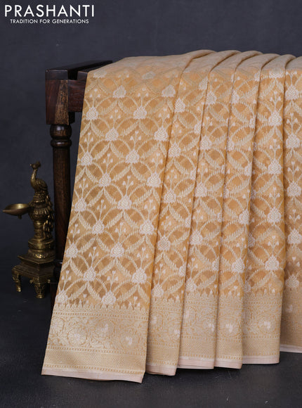 Banarasi silk cotton saree sandal with allover zari weaves and zari woven border