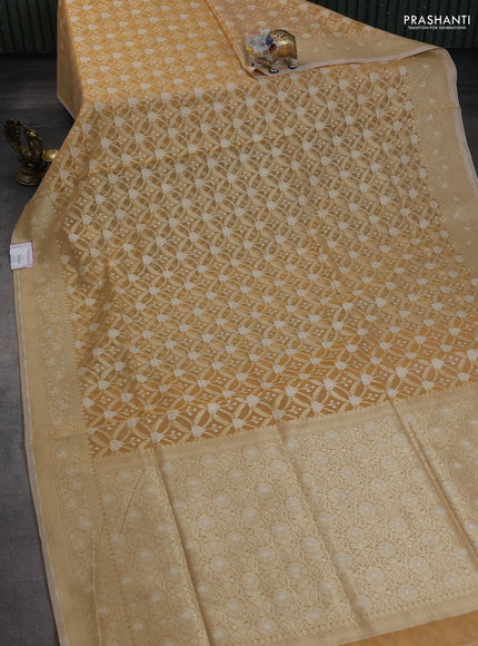 Banarasi silk cotton saree sandal with allover zari weaves and zari woven border