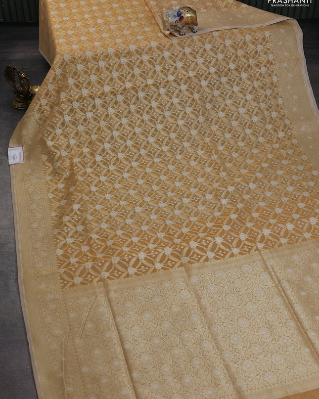 Banarasi silk cotton saree sandal with allover zari weaves and zari woven border