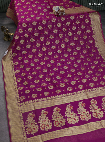 Banarasi silk cotton saree purple with allover floral zari woven buttas and zari woven border