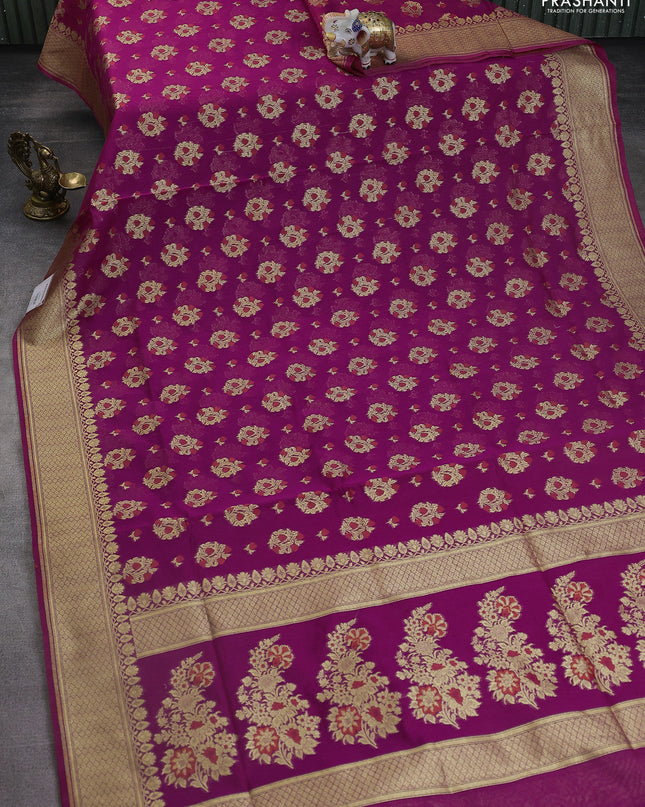 Banarasi silk cotton saree purple with allover floral zari woven buttas and zari woven border