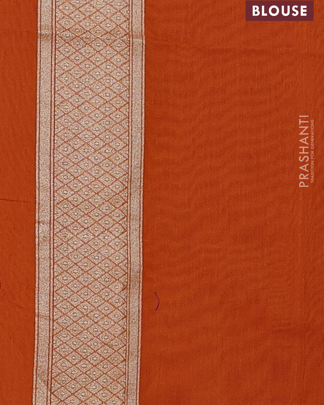 Banarasi silk cotton saree orange with allover floral zari woven buttas and zari woven border