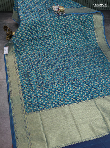 Banarasi silk cotton saree dual shade of bluish green with allover thread weaves & zari woven buttas and temple zari woven border