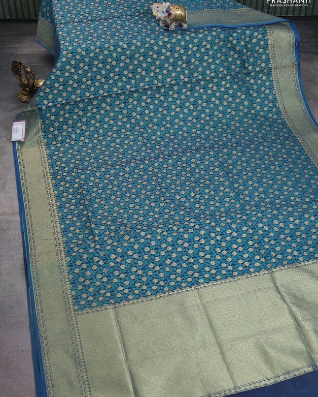 Banarasi silk cotton saree dual shade of bluish green with allover thread weaves & zari woven buttas and temple zari woven border