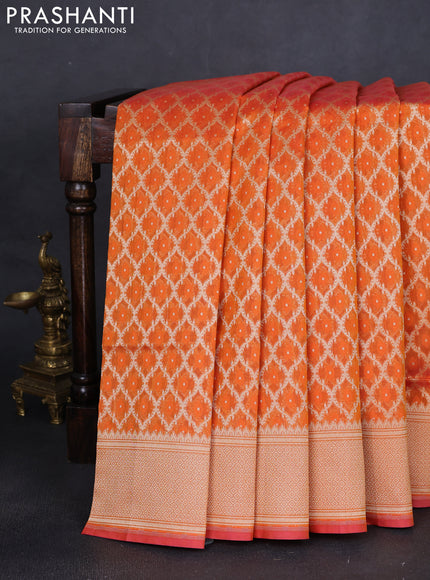Banarasi silk cotton saree orange with allover zari weaves & thread woven buttas and temple zari woven border