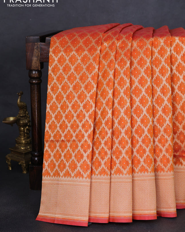 Banarasi silk cotton saree orange with allover zari weaves & thread woven buttas and temple zari woven border