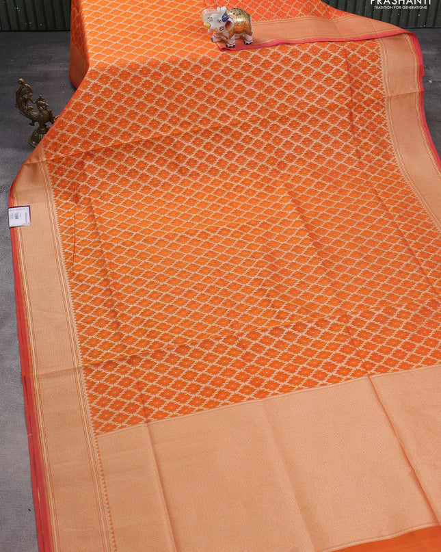 Banarasi silk cotton saree orange with allover zari weaves & thread woven buttas and temple zari woven border