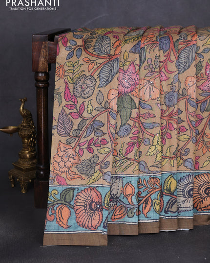 Semi tussar saree mustard yellow and mehendi green with allover kalamkari prints and mirror work