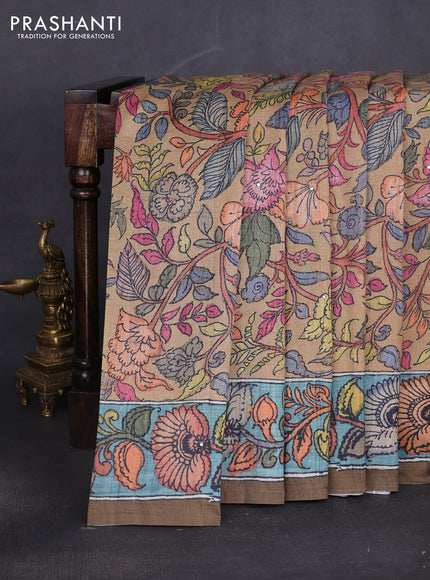 Semi tussar saree mustard yellow and mehendi green with allover kalamkari prints and mirror work