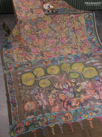 Semi tussar saree mustard yellow and mehendi green with allover kalamkari prints and mirror work