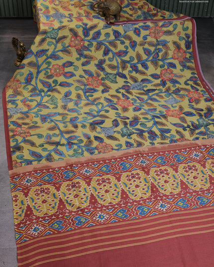 Semi tussar saree yellow and rust shade with allover kalamkari prints and mirror work
