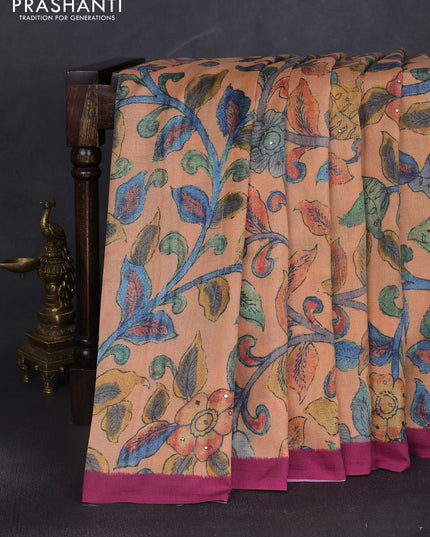 Semi tussar saree orange and pink with allover kalamkari prints and mirror work