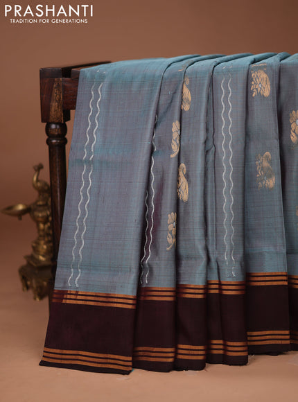 Pure uppada silk saree pastel blue shade and coffee brown with allover silver & gold zari weaves and rettapet zari woven border