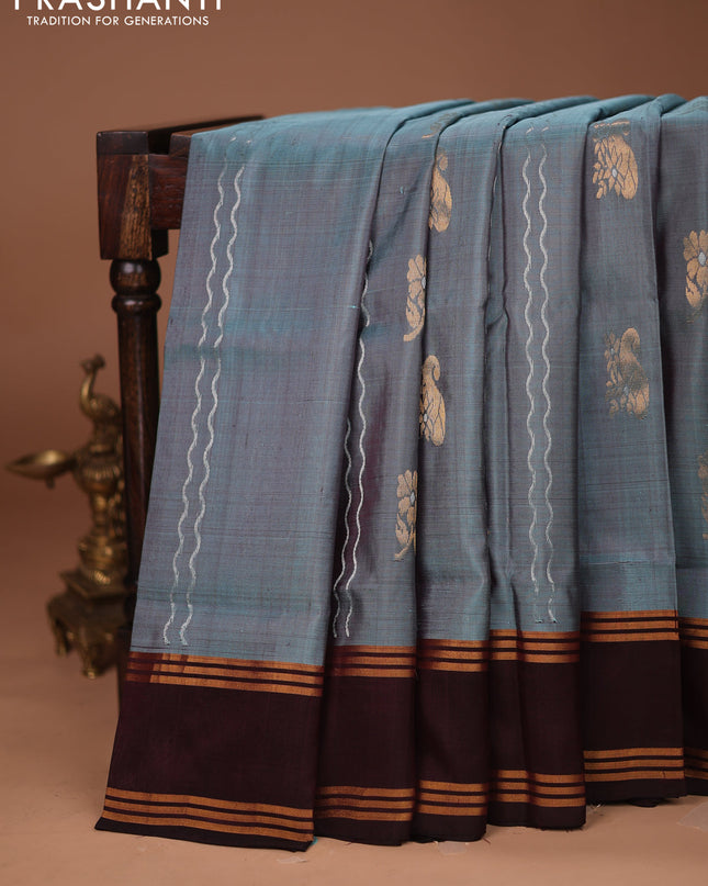 Pure uppada silk saree pastel blue shade and coffee brown with allover silver & gold zari weaves and rettapet zari woven border