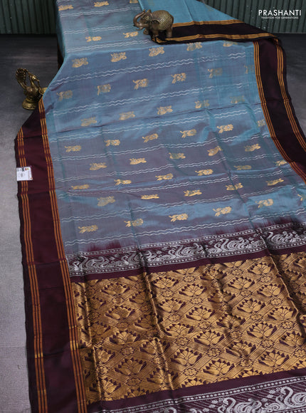 Pure uppada silk saree pastel blue shade and coffee brown with allover silver & gold zari weaves and rettapet zari woven border