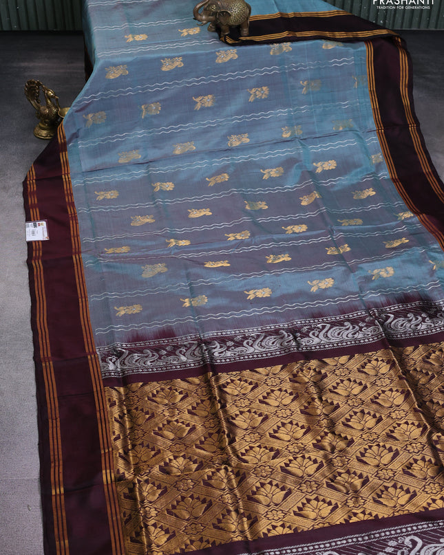 Pure uppada silk saree pastel blue shade and coffee brown with allover silver & gold zari weaves and rettapet zari woven border