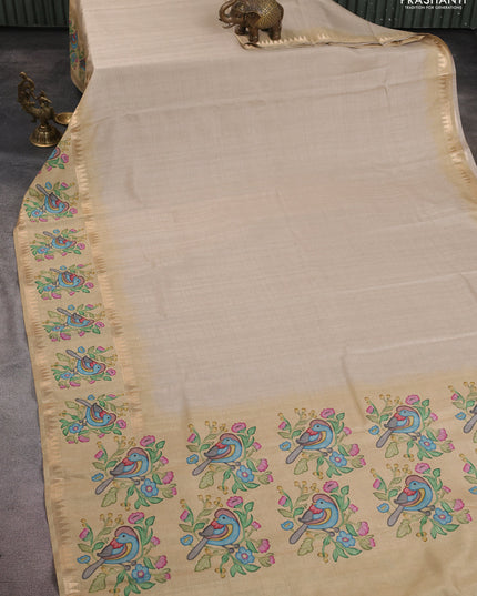 Art tussar saree beige and sandal with plain body and tanjore printed border