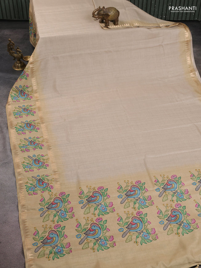 Art tussar saree beige and sandal with plain body and tanjore printed border