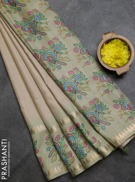 Art tussar saree beige and pista green with plain body and tanjore printed border