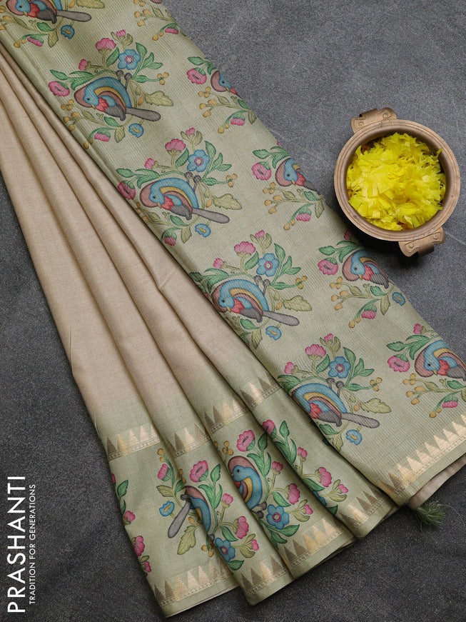 Art tussar saree beige and pista green with plain body and tanjore printed border