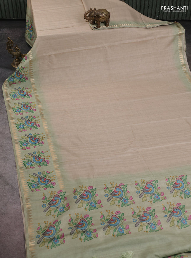 Art tussar saree beige and pista green with plain body and tanjore printed border