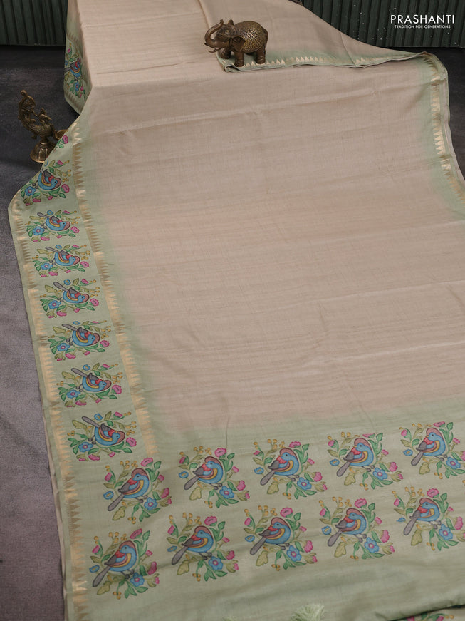 Art tussar saree beige and pista green with plain body and tanjore printed border
