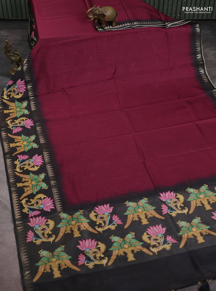 Art tussar saree wine shade and black with plain body and tanjore printed border