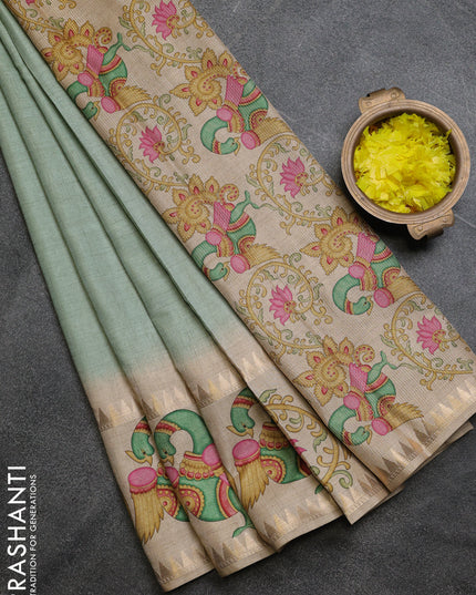 Art tussar saree pastel green and beige with plain body and tanjore printed border