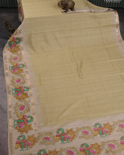 Art tussar saree pale yellow and beige with plain body and tanjore printed border