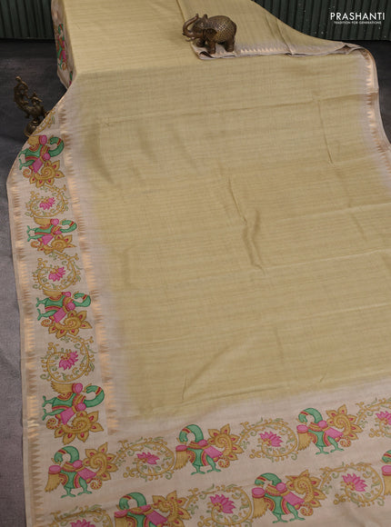 Art tussar saree pale yellow and beige with plain body and tanjore printed border