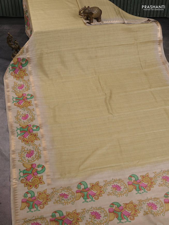 Art tussar saree pale yellow and beige with plain body and tanjore printed border
