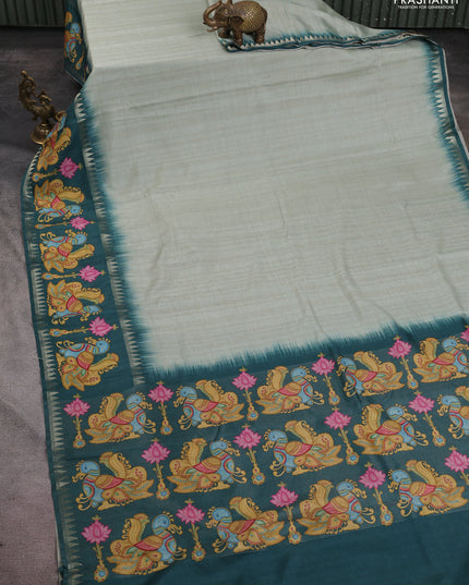 Art tussar saree pastel green and peacock green with plain body and tanjore printed border