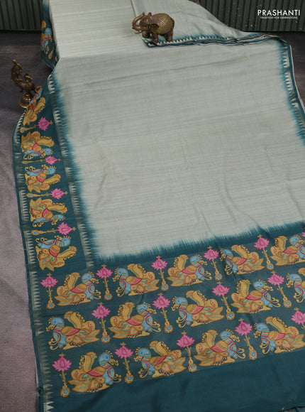 Art tussar saree pastel green and peacock green with plain body and tanjore printed border