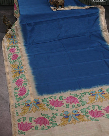 Art tussar saree peacock blue and beige with plain body and tanjore printed border
